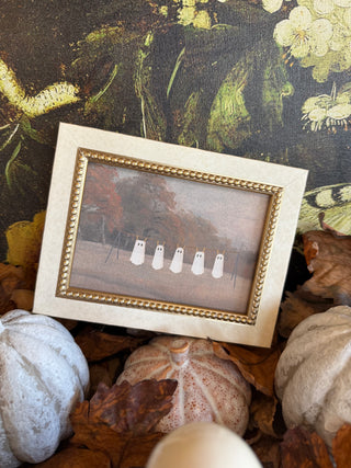 Ghostly Clothes Line Framed Wall Art