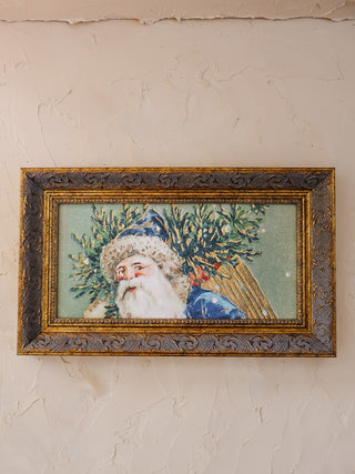 Santa Dressed In Blue Framed Wall Art