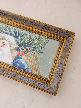 Santa Dressed In Blue Framed Wall Art